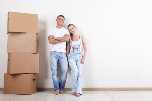 Student removals support for a move in Tooting with boxes and furniture