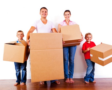 Furniture removal team handling bulky items in a Tooting home