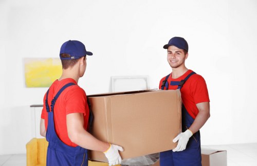 Careful loading of furniture and boxes during a flat removal in Tooting