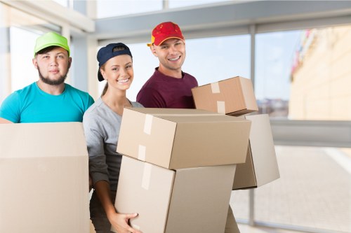 Local office removals team handling equipment and furniture