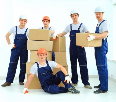 Local packing service preparing boxes for a property move in Tooting