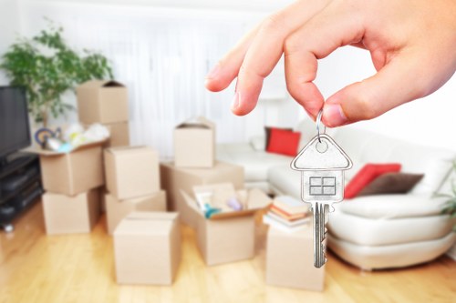Commercial moving team handling office furniture in South London